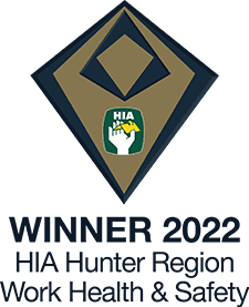 Award badge with a geometric design featuring the HIA logo and text reading WINNER 2022 HIA Hunter Region Work Health & Safety.