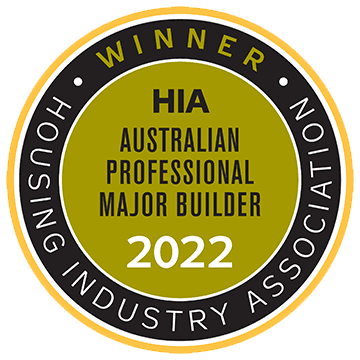 A round gold and black badge reads WINNER HIA Australian Professional Major Builder 2022 with Housing Industry Association written in a ring around the edge.