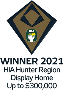 Award badge with geometric shapes and a hand holding a house, labeled HIA. Text below reads: Winner 2021 HIA Hunter Region Display Home Up to $300,000.